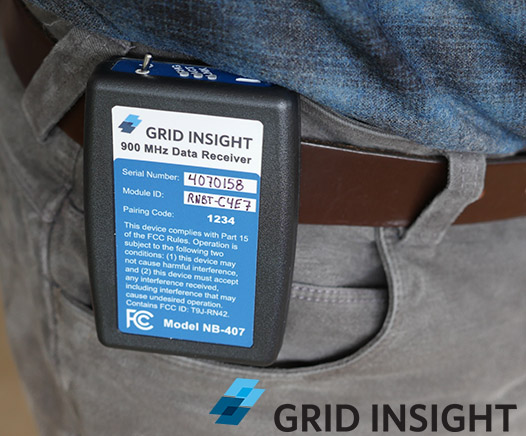 Grid Insight NB-407 Receiver shown attached to a belt